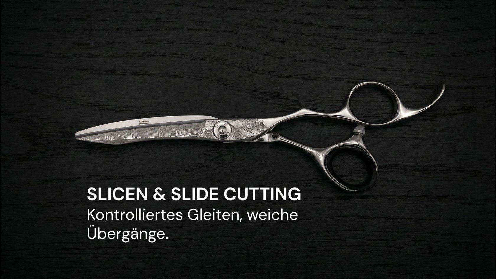 Friseurschere "Damast 5.5" – Präzision trifft Perfektion von SHIDOSHA mit detailreicher Gravur und ergonomischem Griffdesign.