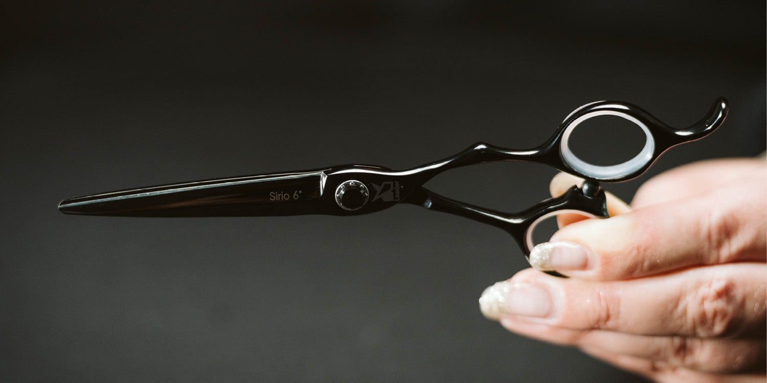 Friseurschere "Sirio Black" – Eleganz in Sternenlicht