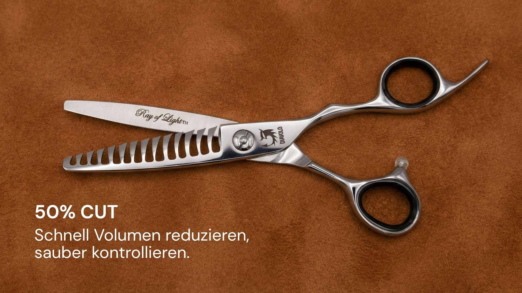 Friseurschere "Ray of Light" – Magie des Lichts von DIAVOLO mit präzisem Volumenreduzierer für kontrolliertes Haarschneiden.